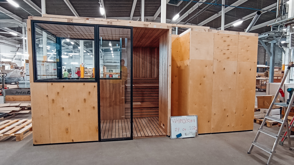 Factory-built modular sauna room ready for delivery, showing prefabricated panels and precision assembly