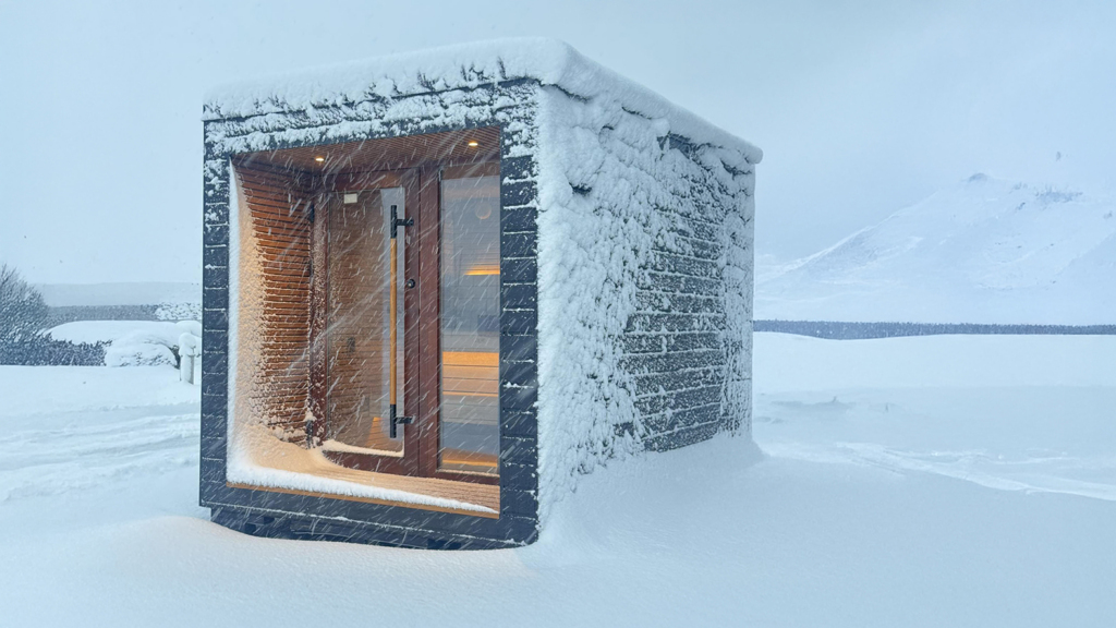 Auroom modular outdoor sauna designed for cold climates, installed in snowy winter conditions
